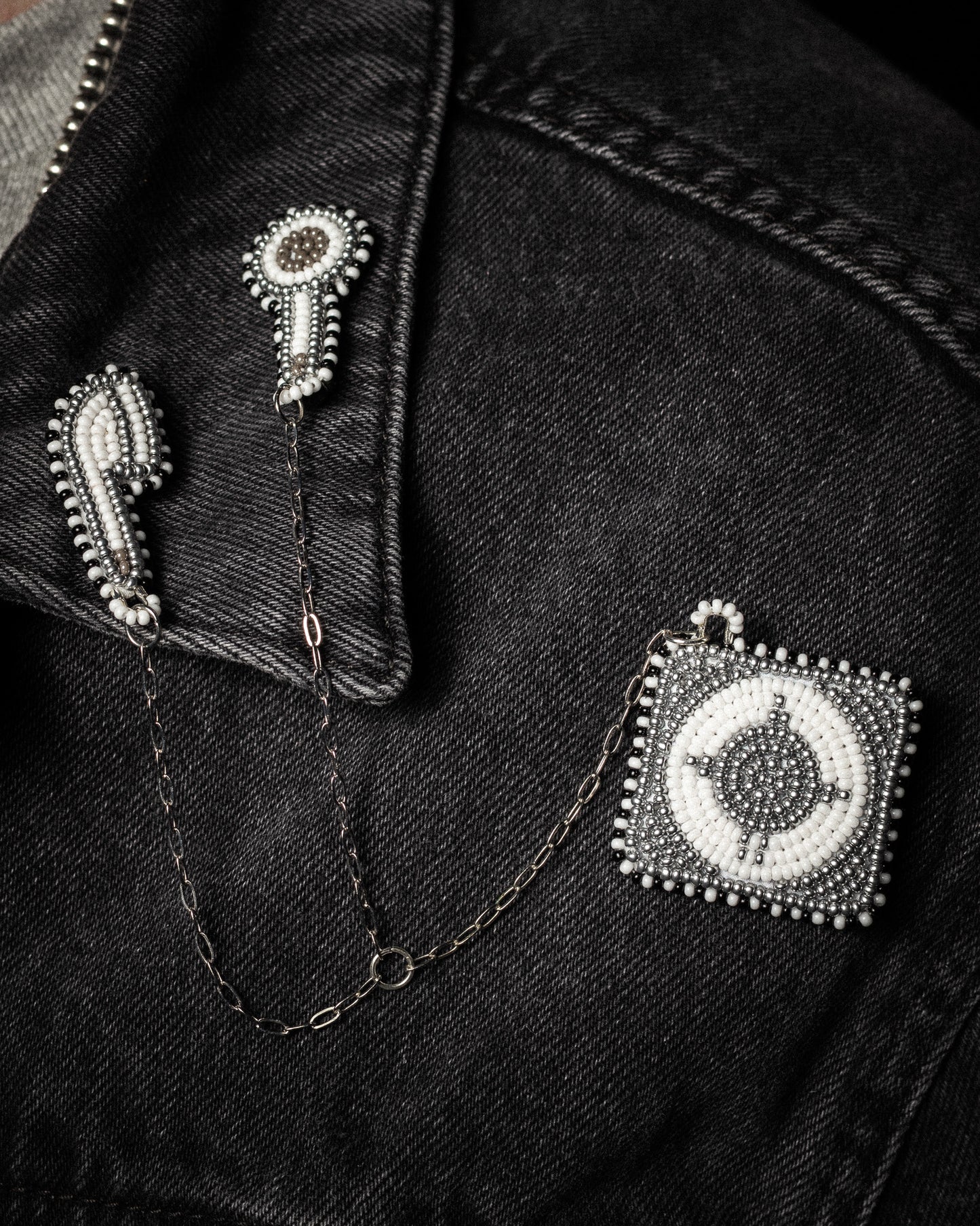 WIRED FOR CHAOS Beaded MP3 Pin (Silver)